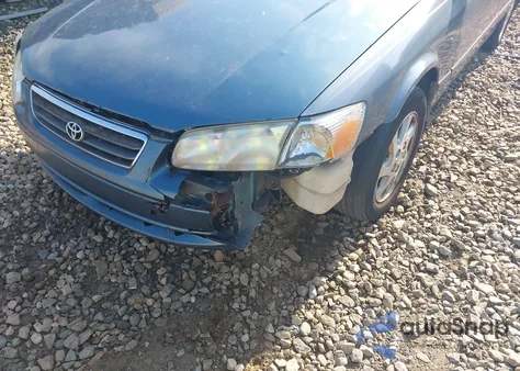 2000 Toyota Camry Le z USA, uszkodzony, nr VIN JT2BG22K5Y0476098